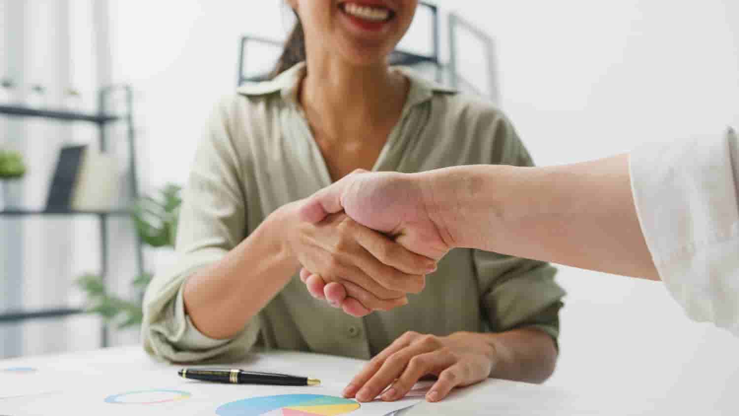 Business handshake meeting